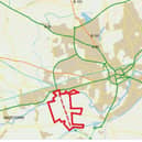The planned zone of development (in red - with the link road in dashes through the middle)