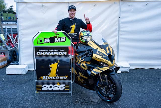 David Allingham celebrates winning the National Superstock 1000 Championship at Brands Hatch. (Photo by Ian Hopgood)