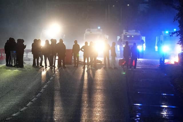 Youths in Portadown in Co Armagh, following three nights of disorder in Ballymena Photo: Brian Lawless/PA Wire