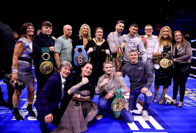 Katie Taylor poses for a photo with her mum Bridget Taylor, her sister Sarah Taylor, her brothers Lee Taylor and Peter Taylor and other members of her family after winning her Undisputed Super Lightweight Championship title fight against Chantelle Cameron at the 3Arena in Dublin, Ireland. (Photo by Liam McBurney/PA Wire)