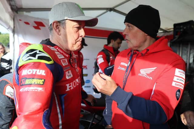 An emotional John McGuinness with former Honda Racing boss Havier Beltran after the Senior TT was cancelled in 2025 because of high winds. (Photo by Stephen Davison/Pacemaker Press)