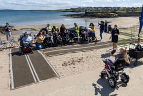 A seaside dance class on disability access beach matting, hosted by Talia Crawford to mark the official opening of the summer season in Groomsport. Pic: Ian Pedlow.