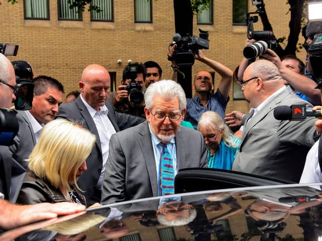 File photo dated 30/06/14 of veteran entertainer Rolf Harris leaving Southwark Crown Court after being found guilty of 12 sex charges involving four women. Pic: Dominic Lipinski/PA Wire