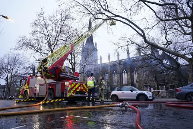 Firefighters at the scene of a fire at St Mark's Church in Hamilton Terrace, St John's Wood, London, which has been destroyed by the blaze which began in the early hours of the morning