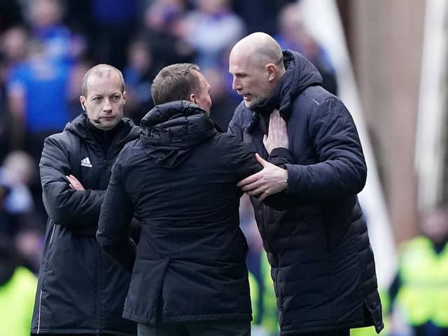 Rangers manager Philippe Clement (right) embraces Celtic manager Brendan Rodgers following the cinch Premiership match at Ibrox Stadium. (Photo by Andrew Milligan/PA Wire)