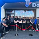 Staff officially cut the ribbon to open the new Domino’s store on Ashbury Avenue, Bangor