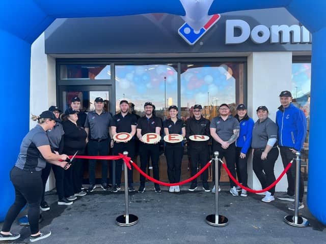 Staff officially cut the ribbon to open the new Domino’s store on Ashbury Avenue, Bangor