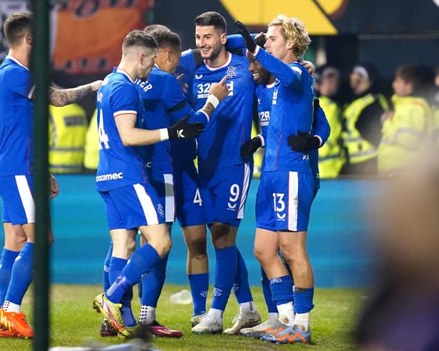 Rangers' Antonio Colak (centre) celebrates scoring his side's fourth goal of the game with team-mates during the cinch Premiership match at Easter Road, Edinburgh.