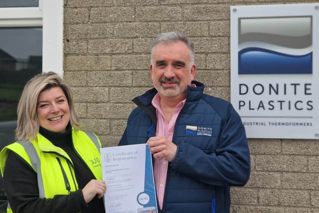 Saintfield-based thermoforming company, Donite Plastics has achieved the globally recognised AS9100 aerospace quality management standard. Pictured  is Paula Brady, chief operating office at Auva presenting the certificate to Donite Plastics’ quality manager, Simon Kyle