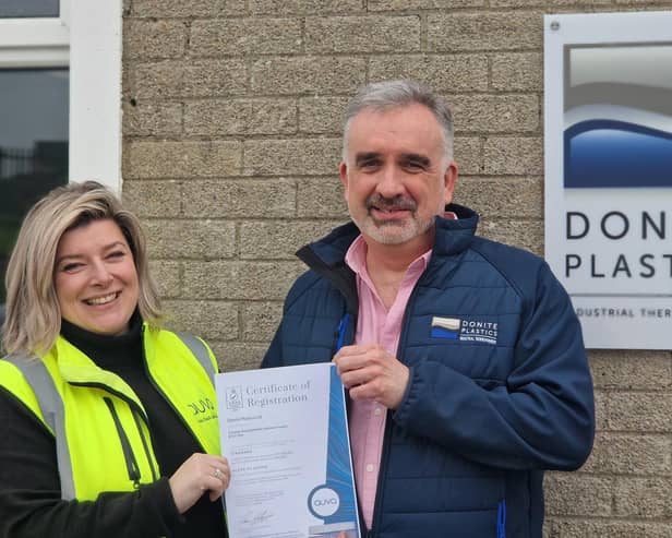 Saintfield-based thermoforming company, Donite Plastics has achieved the globally recognised AS9100 aerospace quality management standard. Pictured  is Paula Brady, chief operating office at Auva presenting the certificate to Donite Plastics’ quality manager, Simon Kyle
