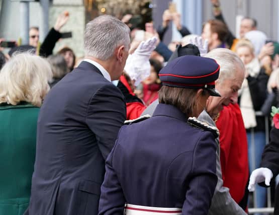 A protester (top left) throws eggs at King Charles III (right) and the Queen Consort (left) as they arrive for a ceremony at Micklegate Bar in York, where the Sovereign is traditionally welcomed to the city. Picture date: Wednesday November 9, 2022.