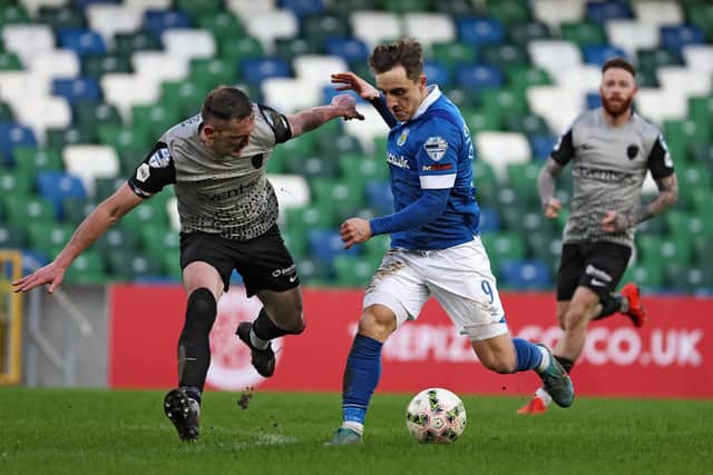 Linfield's Joel Cooper attempting to take on Stephen O'Donnell during a battling 0-0 draw with Coleraine