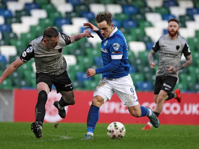 Linfield's Joel Cooper attempting to take on Stephen O'Donnell during a battling 0-0 draw with Coleraine