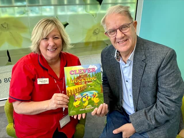 Angela Berry, ward manager, Ulster Hospital, and Colin Millar, MBE, who has written the children's book, Clever Little Duckling