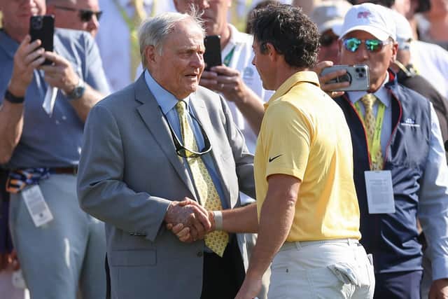 Northern Ireland's Rory McIlroy shakes hands with Tournament Host Jack Nicklaus after his final round of the Memorial Tournament