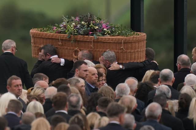 The coffin of Jessica Gallagher, 24, is carried into St Michael's Church, Creeslough, for her funeral mass.