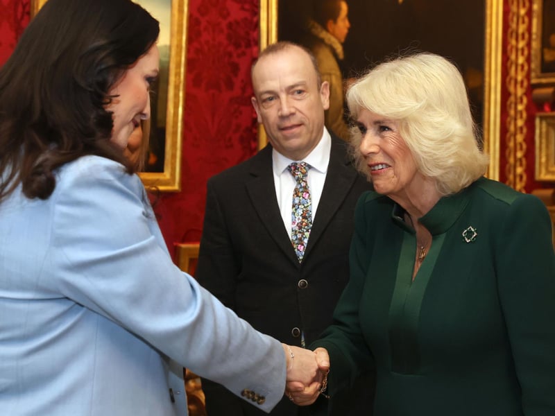 Queen Camilla (right) speaks with Deputy First Minister Emma Little-Pengelly (left) and Northern Ireland Secretary Chris Heaton-Harris