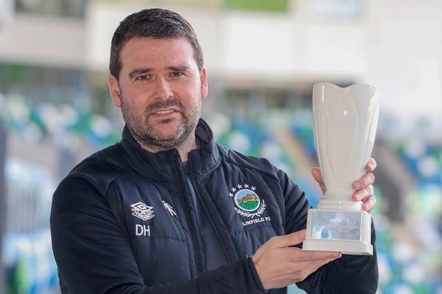 Linfield completed an unbeaten month in March and also collected the first major piece of silverware by beating Coleraine 2-0 in the BetMcLean Cup decider at Windsor Park