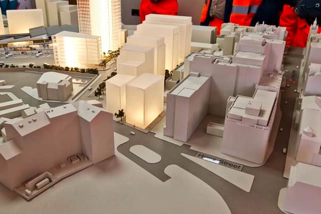 A model of the Grand Central Station development. The station building is to the far top-left (note the little model buses) and Great Victoria Street is the darkened avenue on the right. The glowing buildings in between are commercial blocks which are expected to spring up in the following years