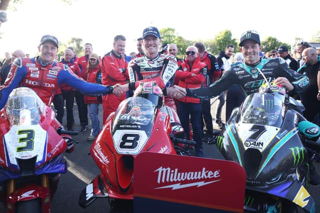 Senior TT racer winner Davey Todd with runner-up Josh Brookes (right) and Dean Harrison