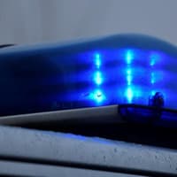 Three officers injured after lorry on wrong side of road hits police car