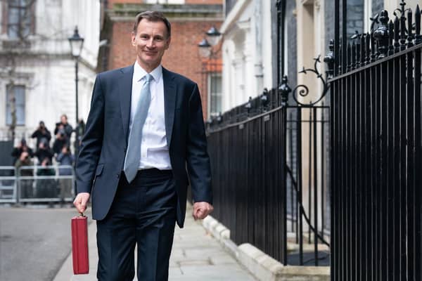 Chancellor of the Exchequer Jeremy Hunt leaves 11 Downing Street, London, with his ministerial box before delivering his Budget in the Houses of Parliament. Photo: Stefan Rousseau/PA Wire