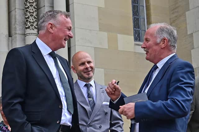 Current manager Michael O’Neill chats with one of the heroes of Spain 82, Billy Hamilton at a service of Thanksgiving for Billy Bingham MBE at St Anne’s Cathedral in Belfast on Wednesday. Pic: Colm Lenaghan/Pacemaker
