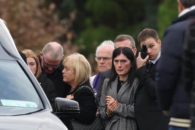 The family of Jessica Gallagher, 24, watch as her coffin leaves St Michael's Church, Creeslough, after her funeral mass. Jessica died following an explosion at Applegreen service station in the village of Creeslough in Co Donegal on Friday. Picture date: Tuesday October 11, 2022. PA Photo. See PA story IRISH Donegal. Photo credit should read: Liam McBurney/PA Wire 