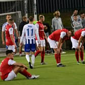 Larne players dejected after a Champions League loss to HJK Helsinki over extra-time in the first qualifying round's second leg at Solitude. (Photo by Colm Lenaghan/Pacemaker)