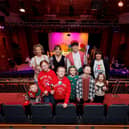 Pictured (back row) is Faith Holden, Gwyneth Compston (Power NI), Aizan Martin and Lisa Allen (Angel Eyes representative). They are joined by Freddie, Polly-Anna, Heidi, Rebecca, Euan and Isabella.