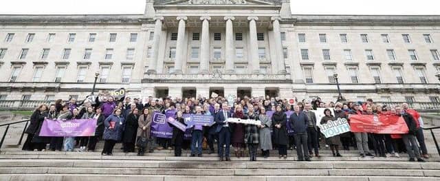 Reverse cuts to funding for frontline community services in Northern Ireland.