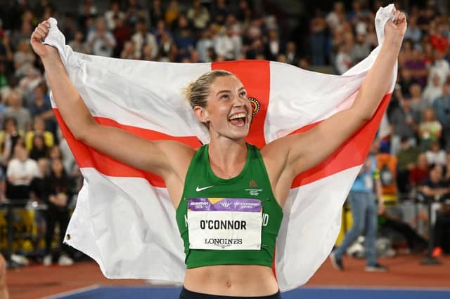 Silver medal winner Kate O'Connor of Team NI celebrates with the Ulster Banner flag following the women's heptathlon on day six of the Commonwealth Games at Alexander Stadium on August 03, 2022 in Birmingham (photo by David Ramos/Getty Images)
