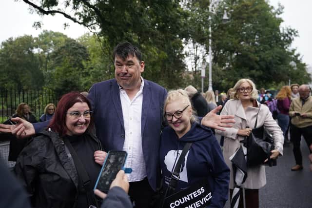 Writer Graham Linehan with  protestors at a Let Women speak rally at Merrion Square in Dublin on Saturday Photo: Niall Carson/PA Wire