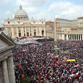 Crowds pack St.Peter’s Square at the Vatican on April 8, 2005, for the funeral of Pope John Paul II. Looking back, the chances of a Belfast-based writer and photographer bumping in to each other in such a huge audience on such an historic day must have been thousands to one