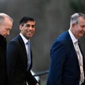 Prime Minister Rishi Sunak (centre) with Northern Ireland Secretary Chris Heaton-Harris and new appointed speaker of the Northern Ireland Assembly Edwin Poots arriving at Parliament Buildings at Stormont Castle, Belfast, today