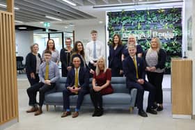 Danske Bank staff celebrate the reopening of the Abbey Centre branch following the completion of a major expansion and refurbishment project