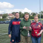 Celebrating the inaugural Terence Pentland Memorial Cup are family members Bryan (second left), Kim and Trudie, plus Chris Wright (Portadown, left) and Gary Magee (Rectory Rangers). (Photo by Portadown FC)