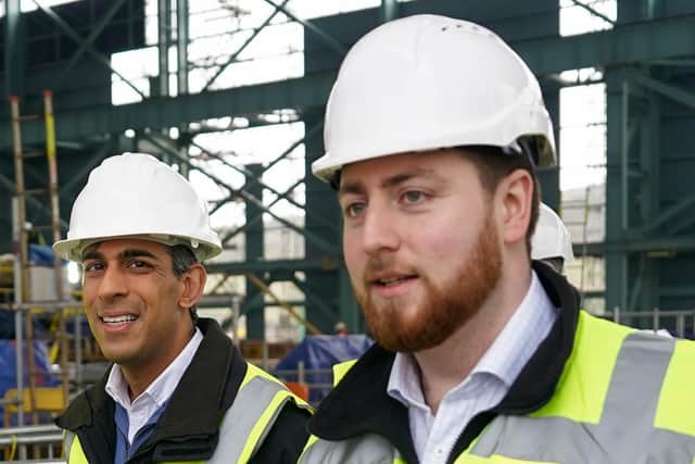 Levelling Up minister Jacob Young - pictured here with Prime Minister Rishi Sunak - is in Northern Ireland today visiting projects funded by the UK government. Photo: Ian Forsyth/PA Wire