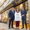 Maeve Monaghan, CEO of NOW Group, pictured with Pete Lunn (Left) and John Lunn (Right) outside Lunn’s Jewellers in Belfast.