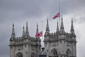 The Union Jack flag flies half mast at Westminster Abbey in London