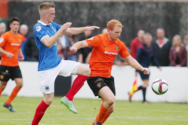 Joe McNeill in action for Carrick Rangers against Linfield's Aaron Burns in 2015. PIC: Jonathan Porter/Press Eye