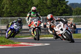 Jason Lynn (J McC Roofing Racing Kawasaki) leads Derek Sheils (Roadhouse Macau BMW) and Richard Cooper (BPE by Russell Racing Yamaha) in the opening Superbike race at the Classic Bike Festival Ireland at Bishopscourt on Saturday