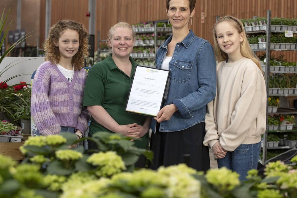 left-right: Kirkinriola Early Years Playgroup members with Bernadette Barnes, Horti Man