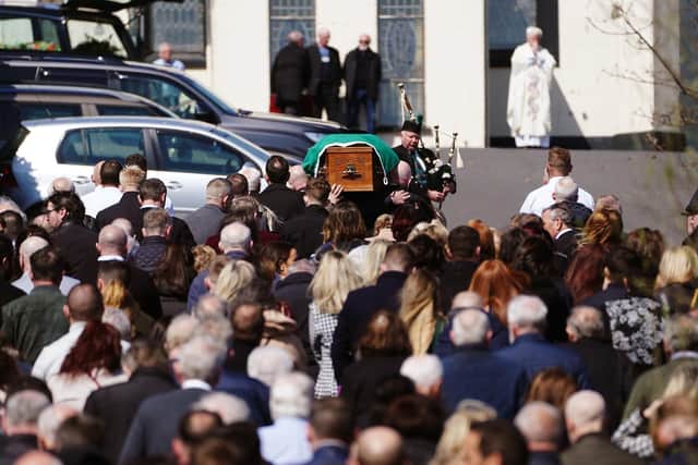The coffin of Colm Murphy, who was found liable in a civil case for the 1998 Omagh bombing, is carried to the Church of St. Laurence O'Toole, Belleeks, Co. Armagh on Friday 21 April 2023.  PA Photo. Brian Lawless/PA Wire.