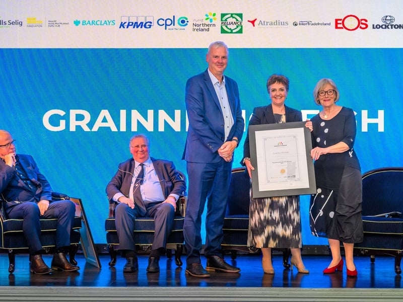 Manufacturing NI chair Richard Hogg with hall of fame inductee Grainne McVeigh from Invest NI and host Wendy Austin