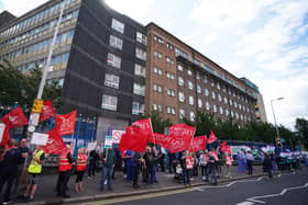 Members of Health trade unions take part in a protest outside the Royal Victoria Hospital in Belfast, to demand a pay increase to help protect workers from the cost-of-living crisis. Picture date: Wednesday August 24, 2022.