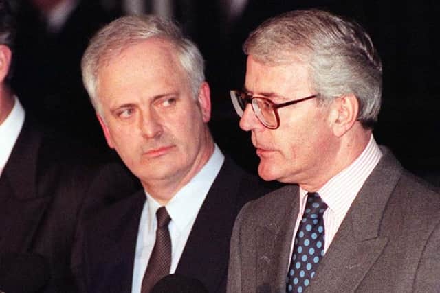 File photo dated 09/12/96 of the then Prime Minister John Major (right) and his Irish counterpart John Bruton