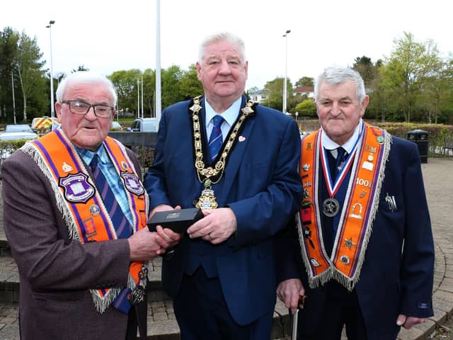The Mayor of Causeway Coast and Glens, Councillor Steven Callaghan has hosted a civic reception to celebrate the hard work of a retiring Orangeman. Pictured are Wor Bro Andy McLean with the Mayor councillor Steven Callaghan and Andy’s brother Sammy McLean