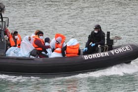 A group of people thought to be migrants are brought into Dover, Kent, by Border Force officers in 2020. Interim leader of the DUP, Gavin Robinson, has today warned against Northern Ireland becoming "a magnet for asylum seekers seeking to escape enforcement" of UK immigration laws