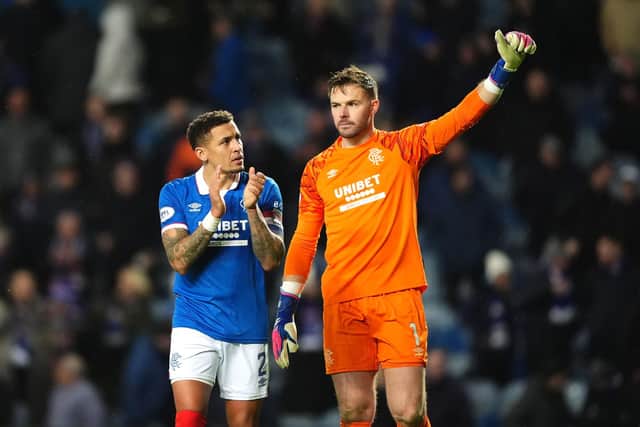 Rangers' James Tavernier and goalkeeper Jack Butland applaud the fans at Ibrox. (Photo by Andrew Milligan/PA Wire)